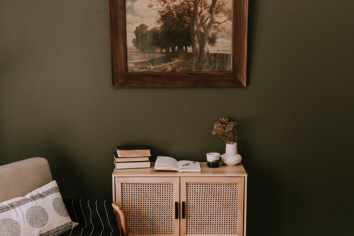 a picture of a room with a chair and a cabinet related to Elevate Your Space with Olive Green Valances: A Comprehensive Guide