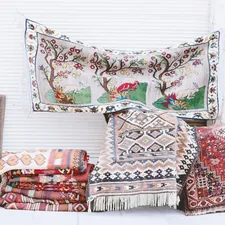 a pile of rugs and pillows sitting next to each other related to Authentic Woven Coverlet Reproductions for Home Decor