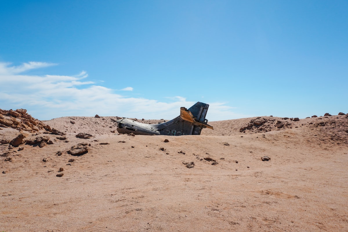 a plane that is sitting in the dirt related to Transform Your Child's Room with a Bulldozer Toddler Bed