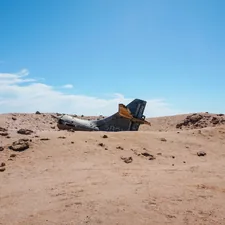 a plane that is sitting in the dirt related to Transform Your Child's Room with a Bulldozer Toddler Bed