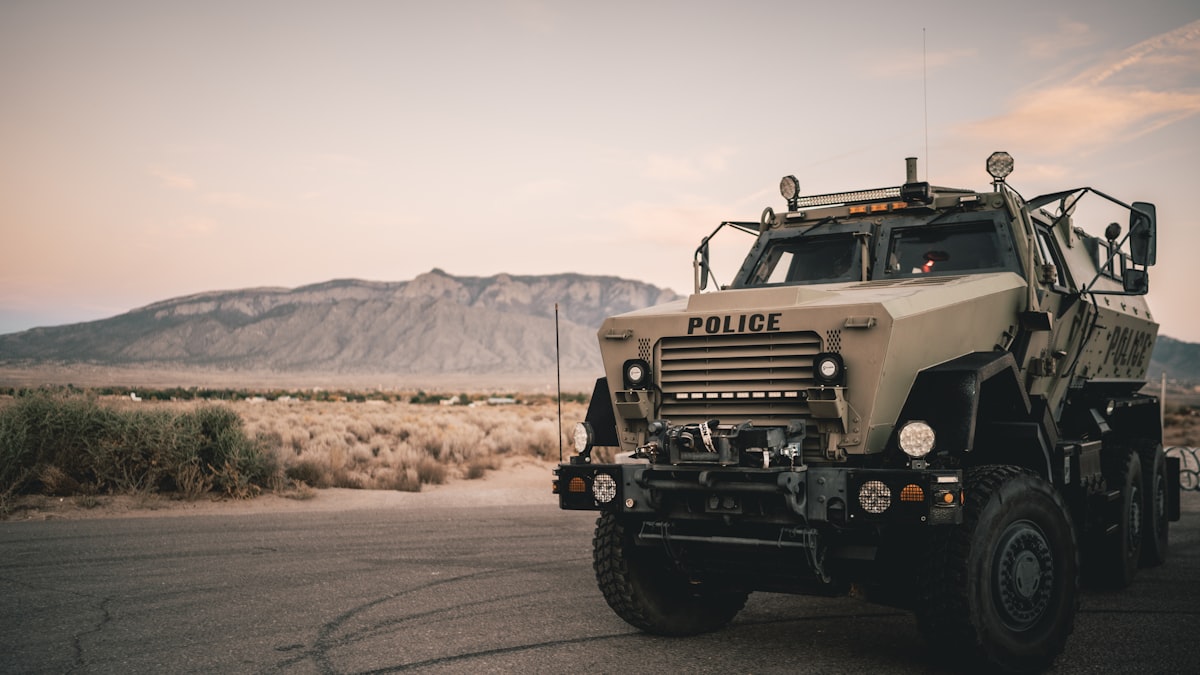 a police truck parked on the side of the road related to Rugged and Reliable: The Military Truck Bed Defined