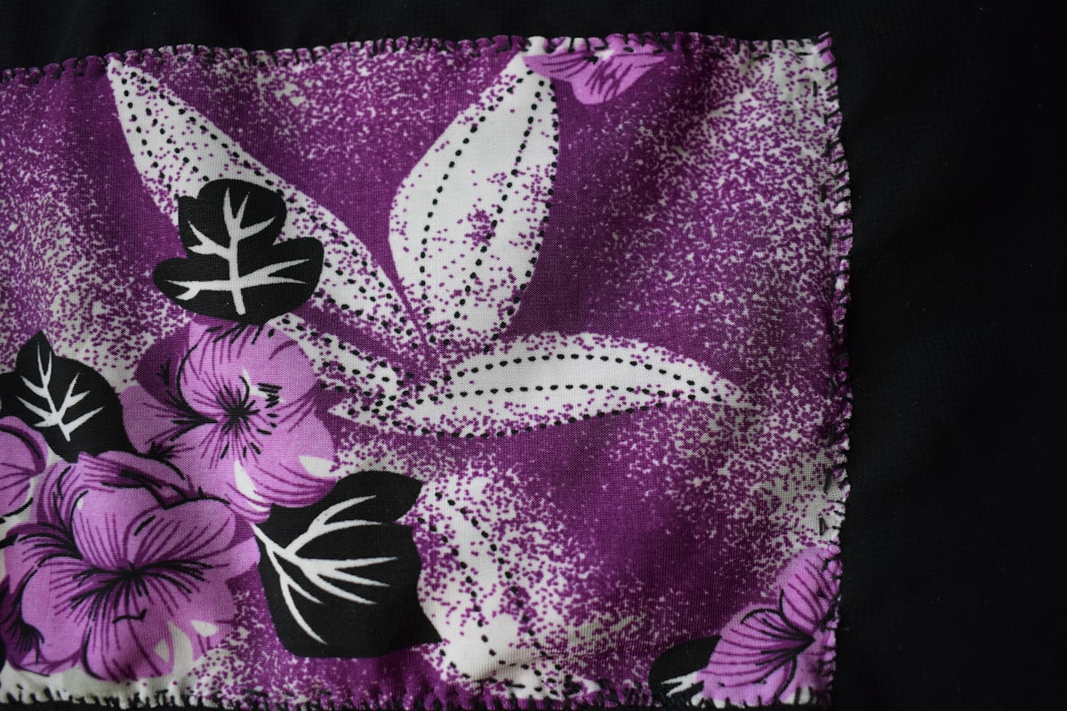 a purple and white flower on a black background related to Tropical Bedspreads & Coverlets