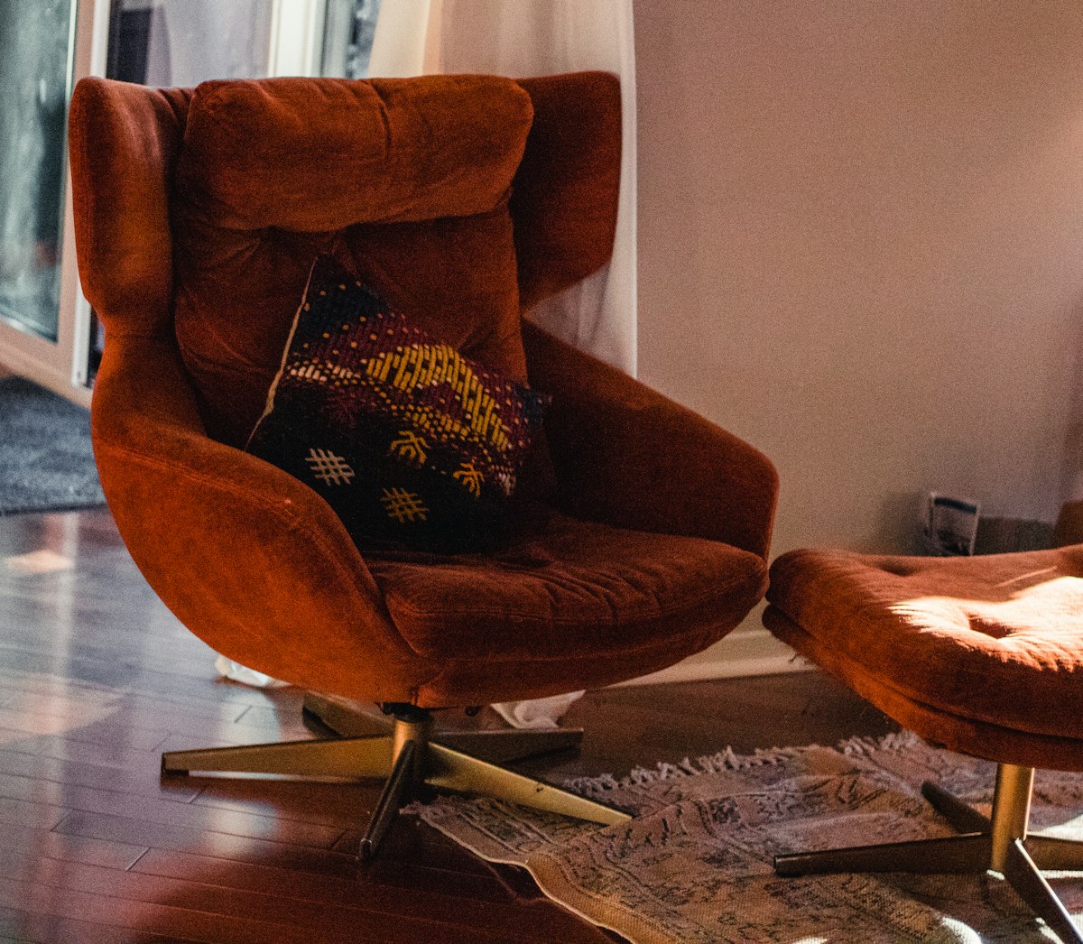 A reading chair in natural light. related to Luxurious Comfort and Style for Your Bedroom
