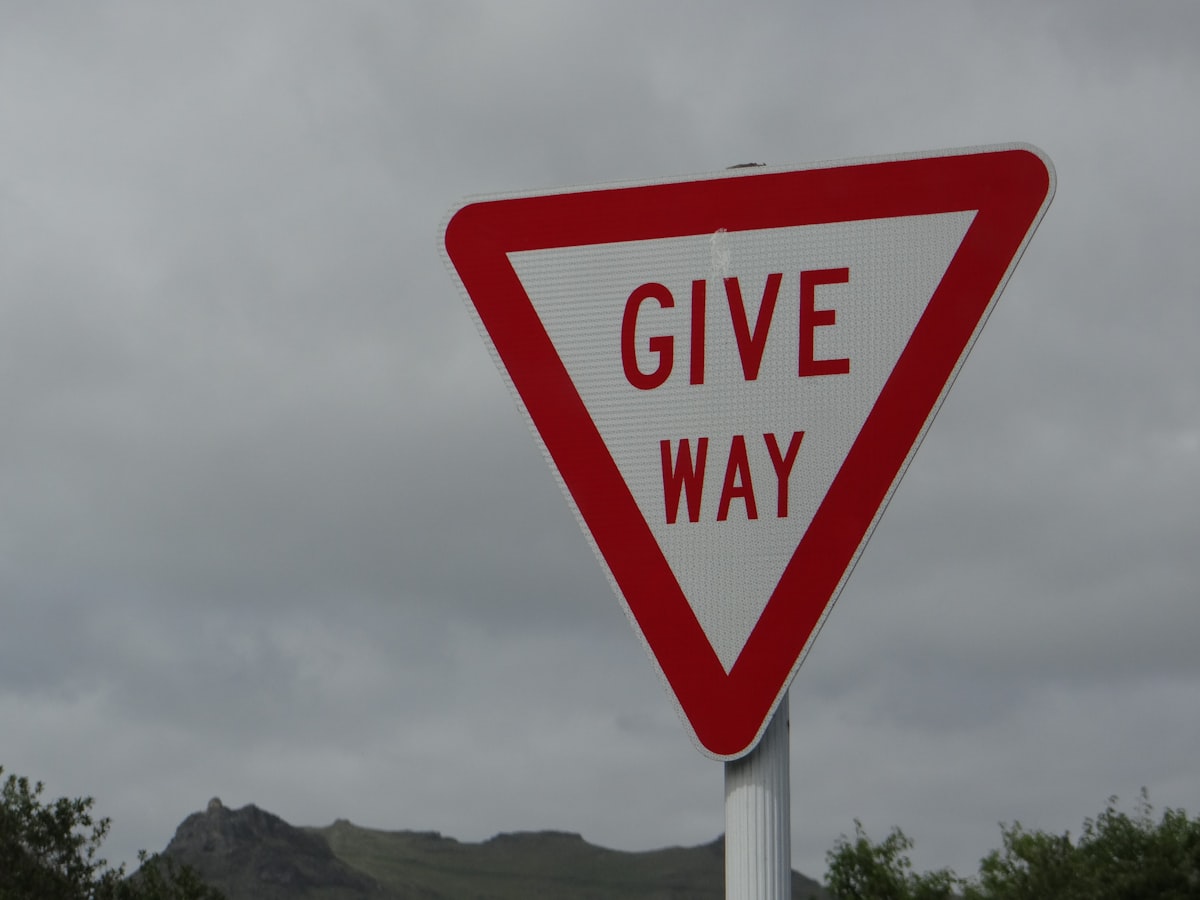 a red and white sign that says give way related to The Cheapest Way to Get Rid of Bed Bugs