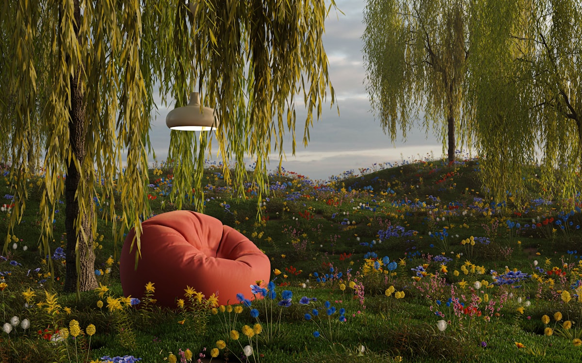 a red bean bag chair sitting in the middle of a field of flowers related to Ultimate Comfort with Versatile Seating Solutions