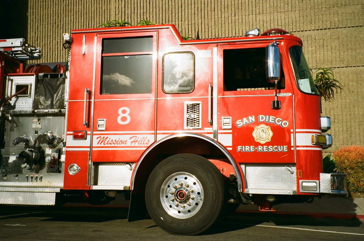 A red san diego fire-rescue truck with number 8 related to The Ultimate Guide to Fire Truck Baby Bedding: Add a Dash of Adventure to Your Nursery