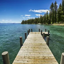 A relaxing spot out on a pier jutting out into Lake Tahoe just outside the Hellman-Erman Mansion historic site. An amazing place to spend an afternoon. related to Exploring the Charm of Lake Tahoe Bed and Breakfasts
