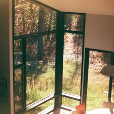 a room with a large window and a lamp related to Design Ideas for Large Windows with Roomy Valances