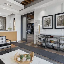 a room with a table and chairs related to Elegant Entryways: A Comprehensive Guide on How to Decorate Your Foyer