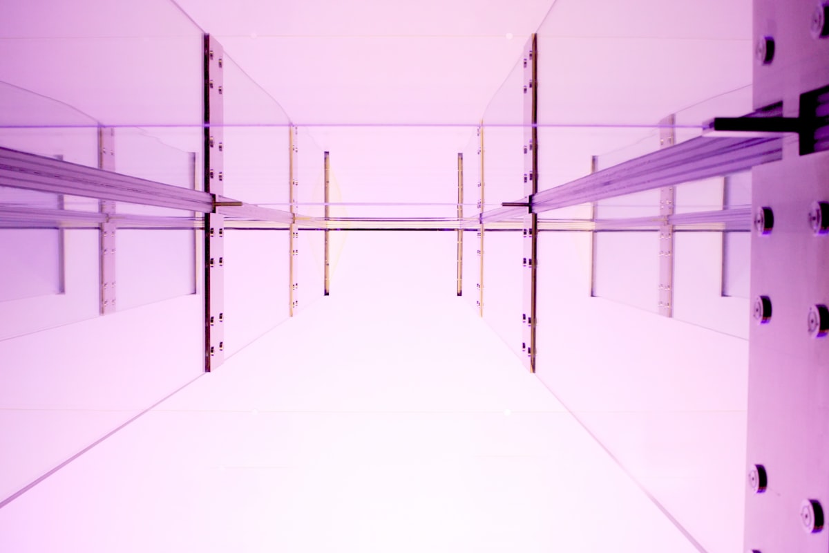 a room with purple walls and a white floor related to The Ultimate Guide to Bed Post Shelves: Maximizing Style and Functionality in Your Bedroom