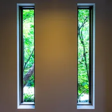 A room with two windows and a bench related to Seamless Style: A Modern Window Valance Pattern