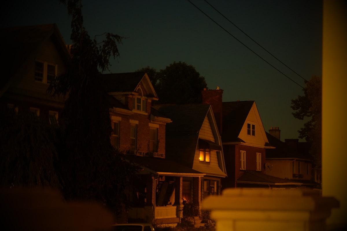 a row of houses lit up at night related to Cozy Retreats: The Best Romantic Bed and Breakfast Ohio Has to Offer