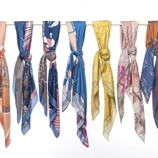 a row of scarves hanging from a clothes line related to Hang Your Scarf Valance: Creative & Stylish Ideas