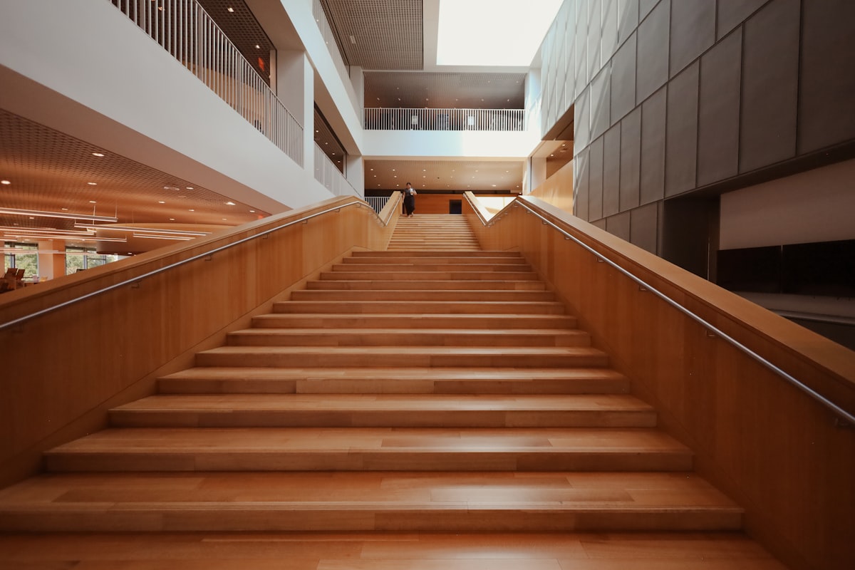 a set of wooden stairs leading up to a building related to Building a Wooden Valance: Step-by-Step Guide
