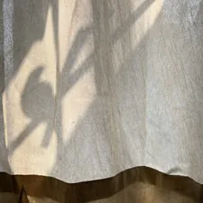 a shadow of a plant on a curtain related to Pinch Pleat Valances