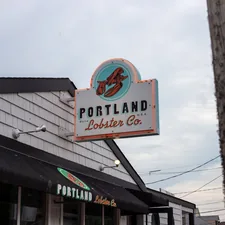 a sign that is on the side of a building related to Discover the Charm of Portland, ME: Top Bed and Breakfast Options