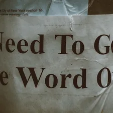 a sign that says need to get the word out related to Your Ultimate Guide to Exterminating Bed Bugs