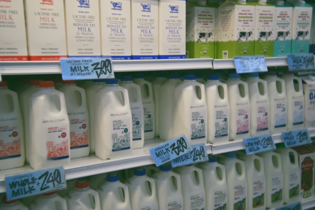 A store shelf filled with lots of milk related to Top Picks for Milk Frothers at Bed Bath & Beyond