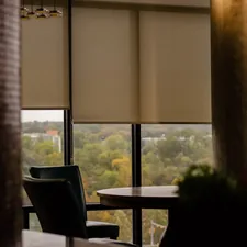 a table and chairs in a room related to Window Blinds with Valance: Elevate Your Home Decor