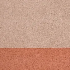 A textured wall with two distinct color blocks. related to The Timeless Appeal of Terra Cotta Chimineas