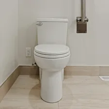 a toilet in a bathroom related to Why a Bidet for Toilet is the Ultimate Upgrade for Your Bathroom