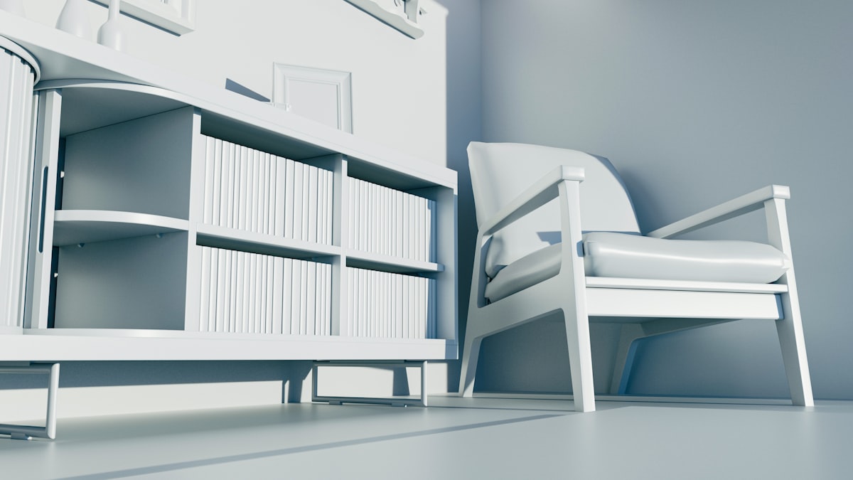 a white chair sitting next to a book shelf related to Elevate Your Home with White Sideboards Furniture