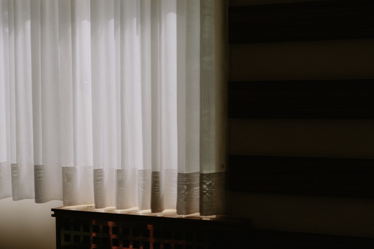 a window with blinds related to Elegant Windows with Sheer Valance Scarf