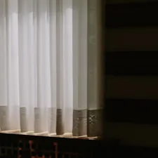 a window with blinds related to Elegant Windows with Sheer Valance Scarf