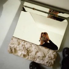 A woman is taking a picture of herself in a mirror related to Bed Bath & Beyond Mirrors: Find the Perfect Mirror for Your Bathroom