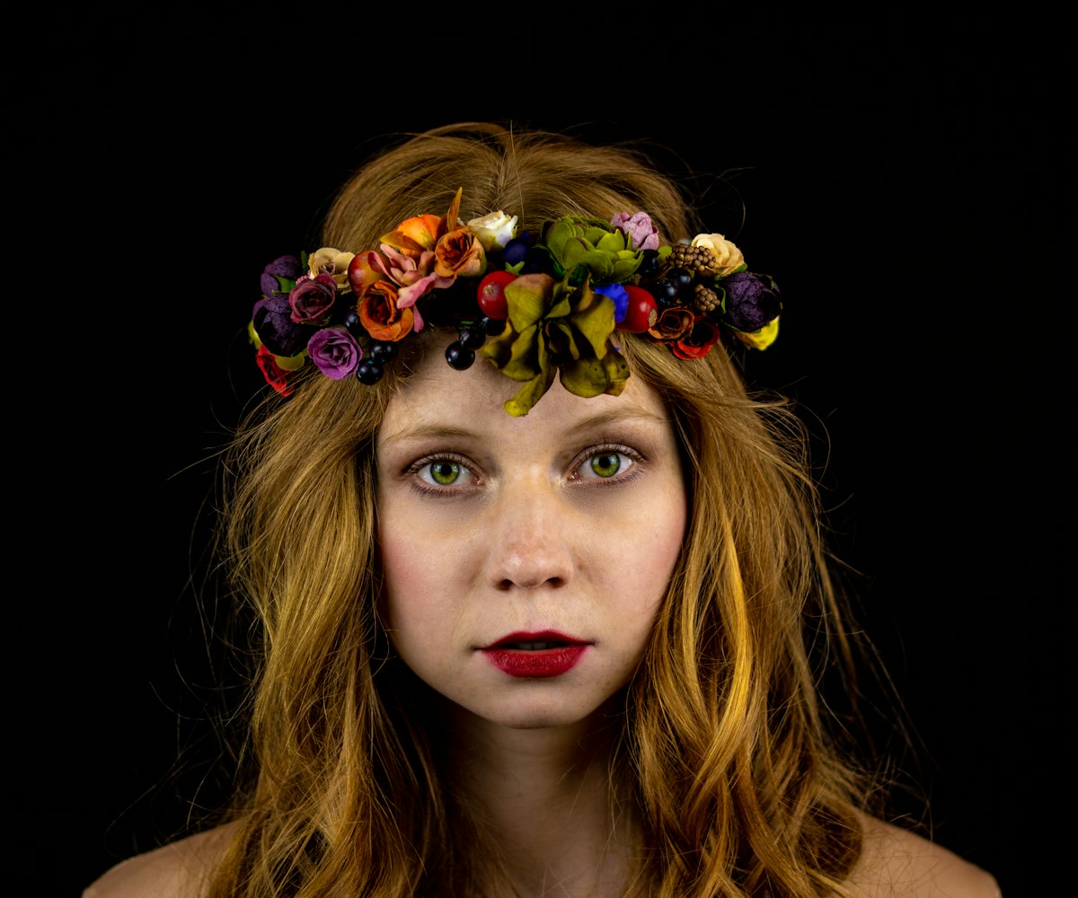 a woman with a flower crown on her head related to Unlock Your Best Hair Yet with Bed Head Colour Goddess: The Ultimate Guide