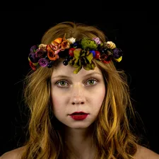 a woman with a flower crown on her head related to Unlock Your Best Hair Yet with Bed Head Colour Goddess: The Ultimate Guide
