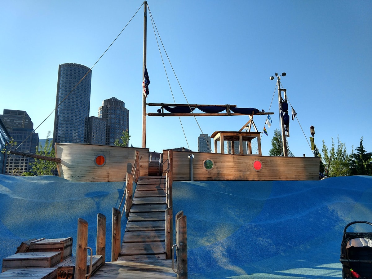 a wooden boat with a ladder going up to it related to Why Pirate Ship Beds Are Every Kid's Dream Bedroom Addition