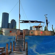a wooden boat with a ladder going up to it related to Why Pirate Ship Beds Are Every Kid's Dream Bedroom Addition