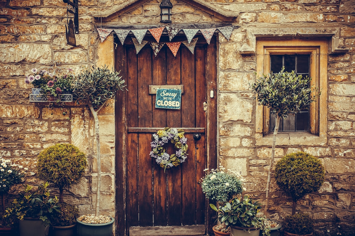 a wooden door in a small village in England related to Add a Rustic Charm to Your Kitchen with Country Valances