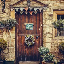 a wooden door in a small village in England related to Add a Rustic Charm to Your Kitchen with Country Valances