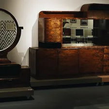 a wooden dresser with a mirror on top of it related to Elevate Your Home with Modern Sideboards & Buffets