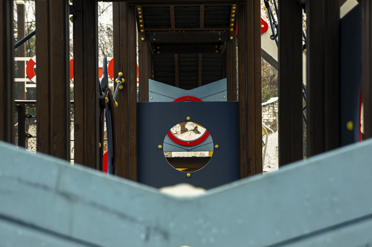 A wooden structure with a clock on top of it related to Thomas the Train Toddler Bed Set: A Fun and Cozy Sleeping Solution for Little Engineers