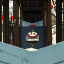 A wooden structure with a clock on top of it related to Thomas the Train Toddler Bed Set: A Fun and Cozy Sleeping Solution for Little Engineers