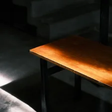 A wooden table sitting in the middle of a room related to Stylish and Functional Oak Entryway Tables to Elevate Your Home's Entrance