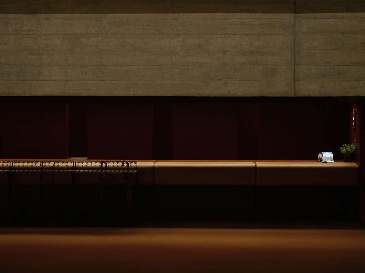 a wooden wall with a light on it related to Maximizing Space with Extra Long Sideboards