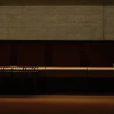 a wooden wall with a light on it related to Maximizing Space with Extra Long Sideboards