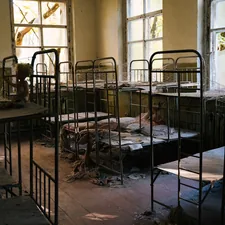 abandoned black metal beds related to Maximizing Space: The Benefits of College Bunk Beds