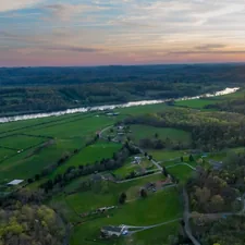 aerial photo of grass field during daytime related to Explore Cozy Stays in Knoxville, TN