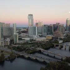 aerial view of city buildings during daytime related to Discover Austin's Charm: A Cozy Bed and Breakfast Getaway