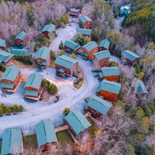 aerial view of houses and trees during daytime related to Snuggle Up in Gatlinburg: A Guide to Cozy Bed & Breakfasts