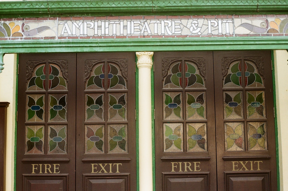 Amphitheatre & pit doors with stained glass related to Transforming First Impressions: Stunning Design Ideas for Entryway