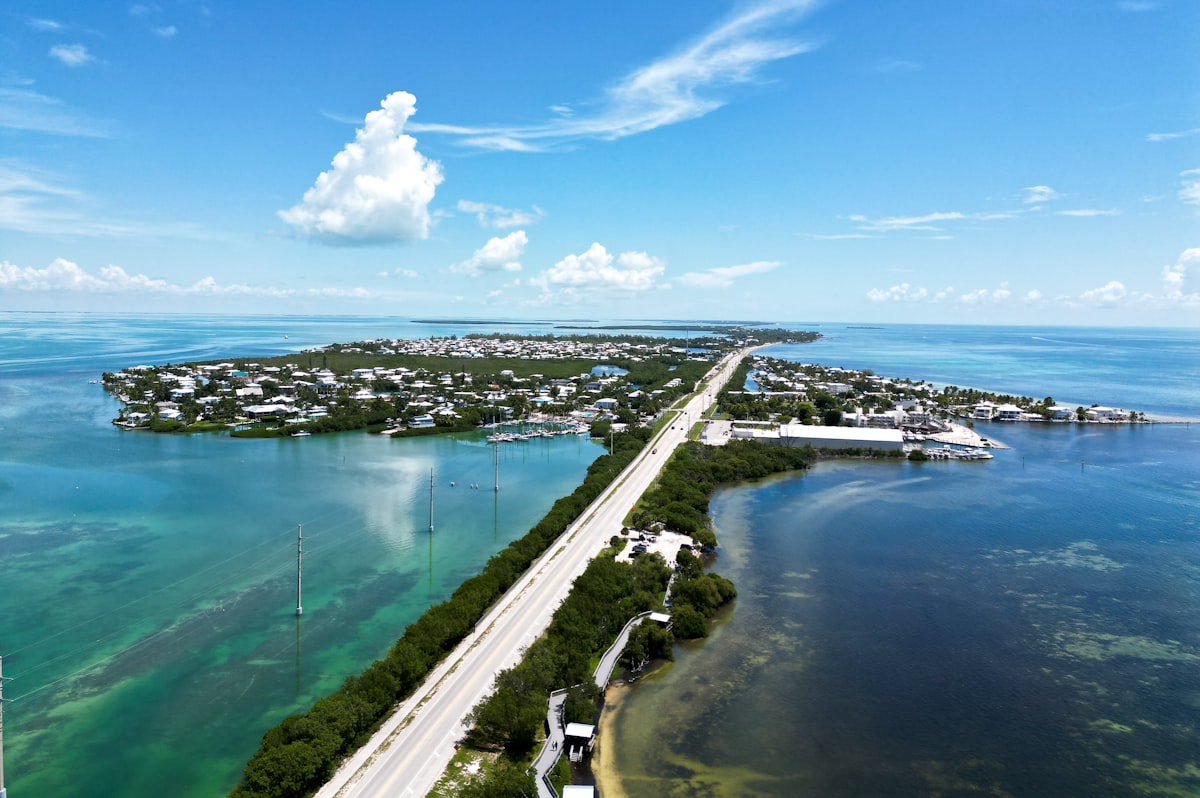 an aerial view of a highway and a body of water related to Discover the Charm of Bed and Breakfasts in the Florida Keys