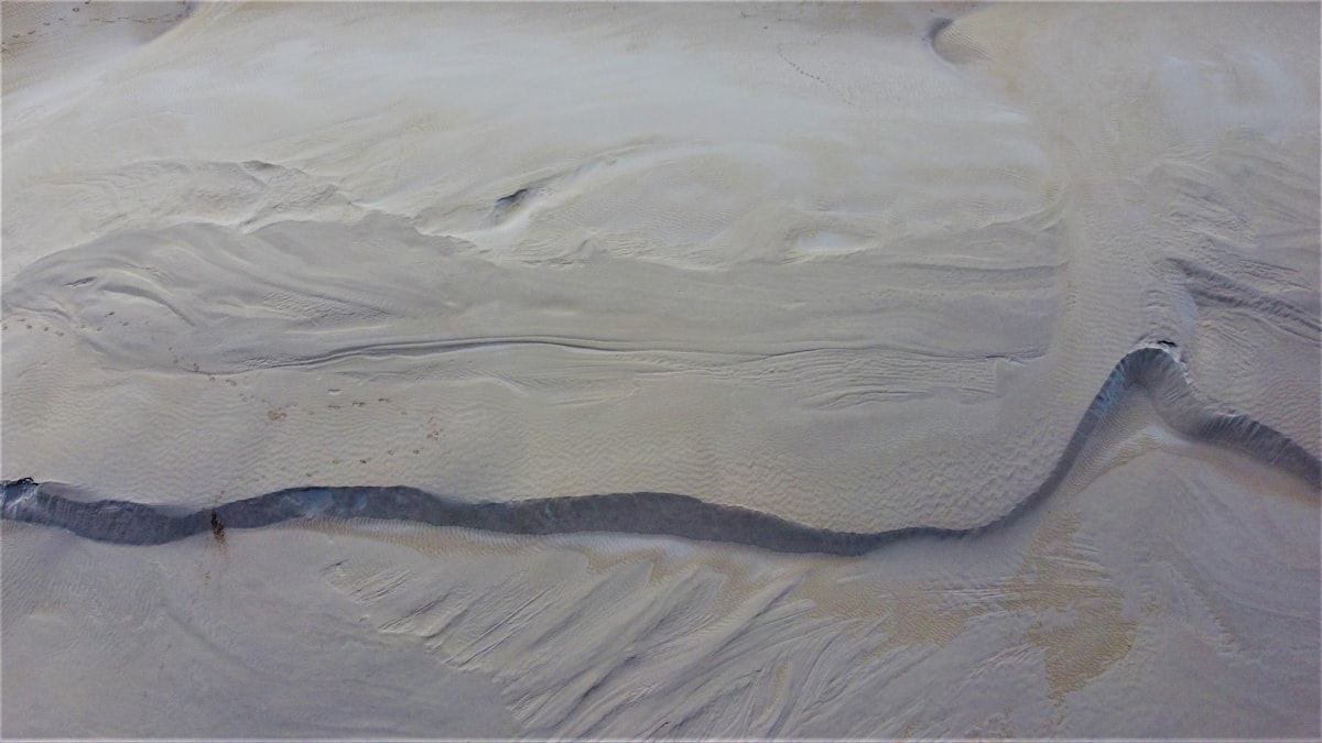 an aerial view of a river in the sand related to Transform Your Truck with White Bed Liner Paint: A Durable and Stylish Choice