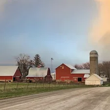 An Amish farm in Iowa after a rain related to Experience Charm and Comfort: A Guide to Bed and Breakfasts in Iowa