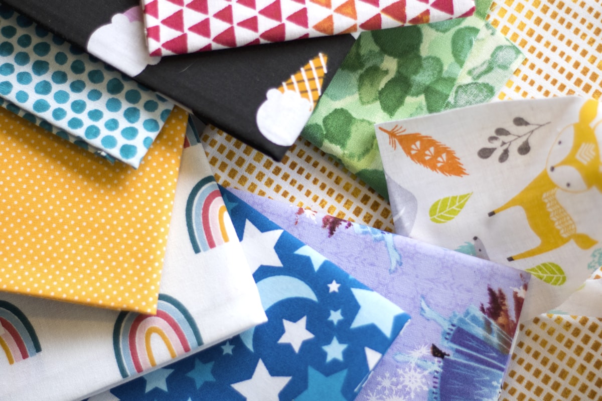 An assortment of fat quarter fabric cuts. related to Sewing Made Easy: Free Valance Patterns to Get You Started